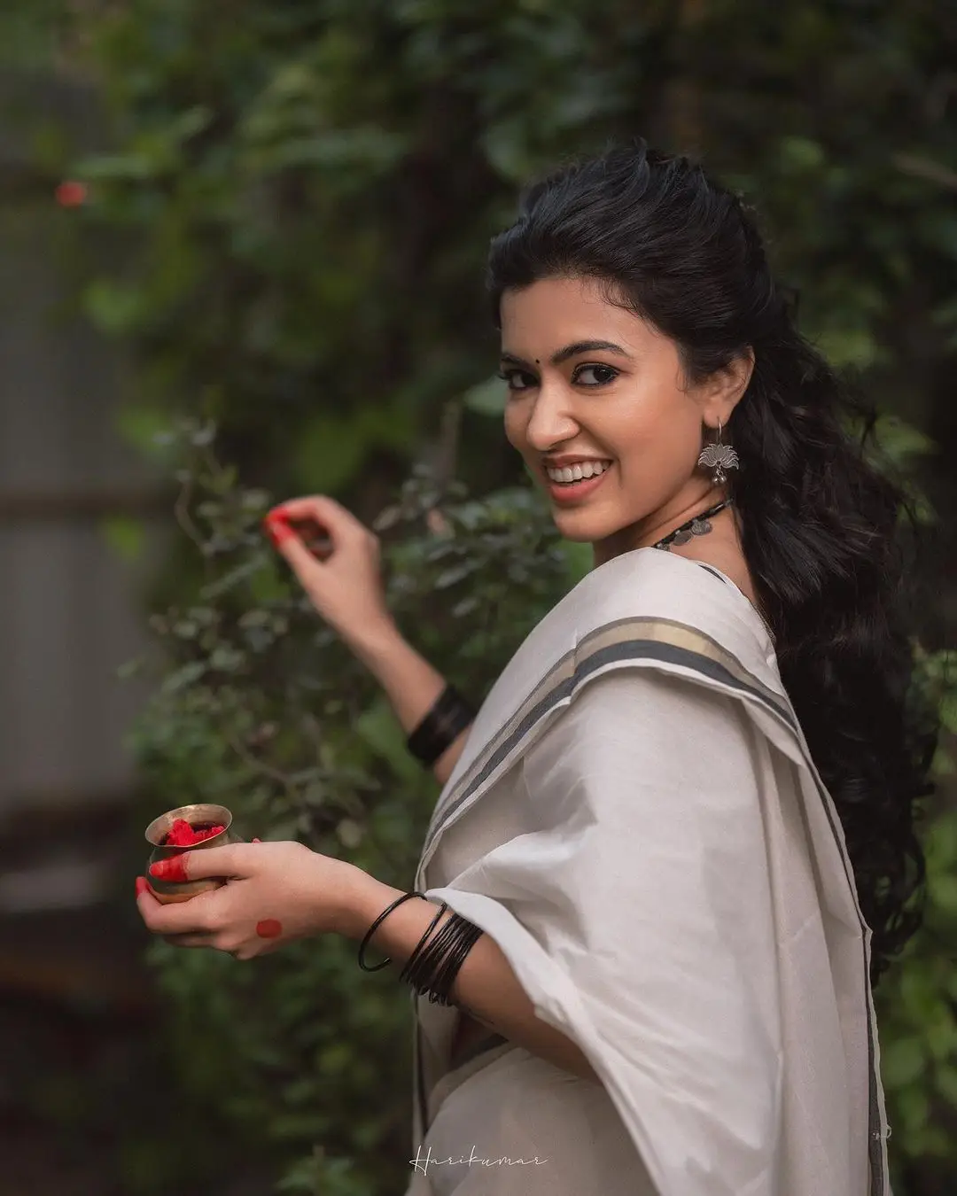 Malayalam Actress Anju Kurian Stills in White Saree Black Blouse